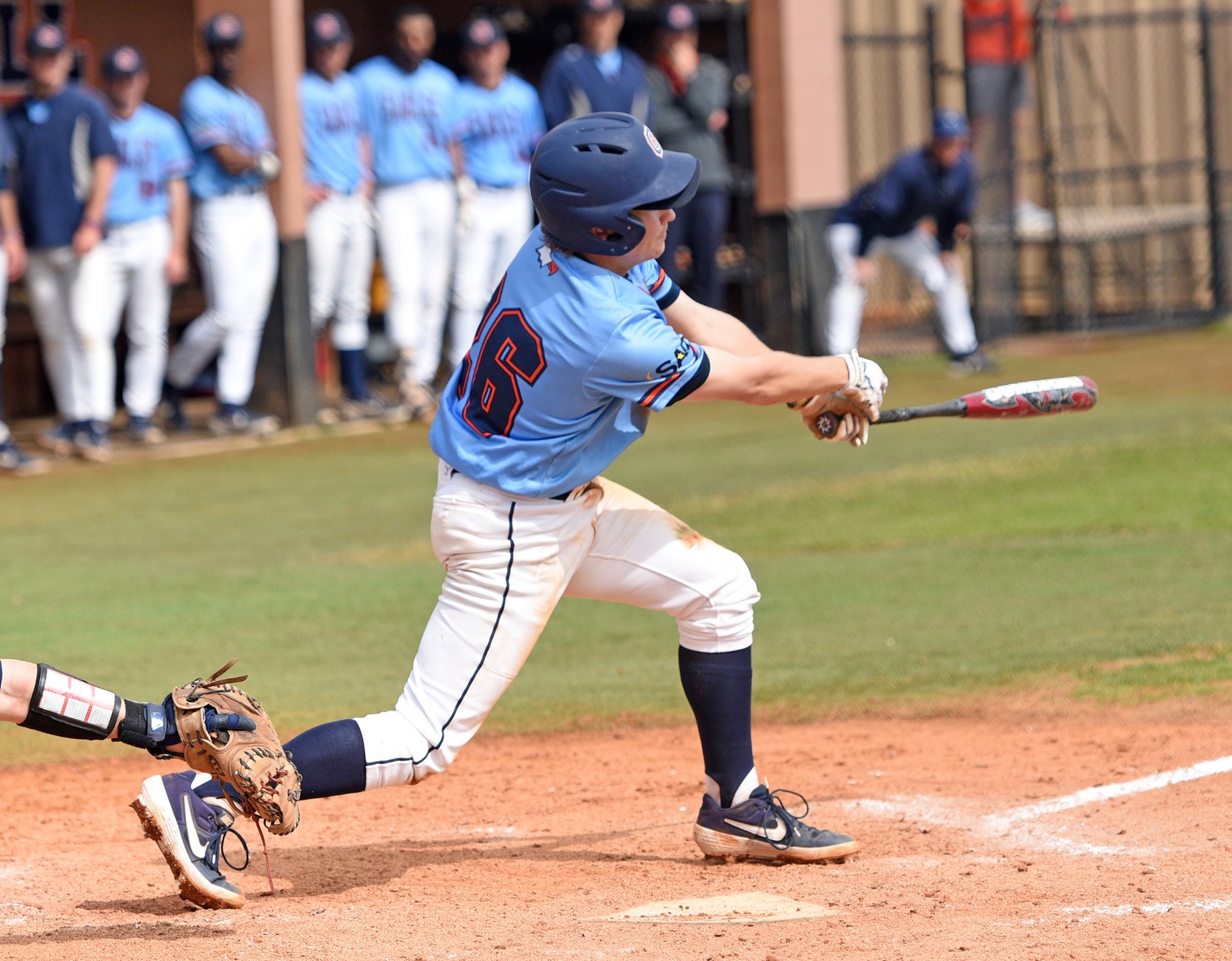 Genter's clutch poke lifts Eagles over Trojans