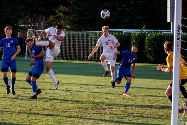 Late comeback cements 300th program victory, win over Chargers
